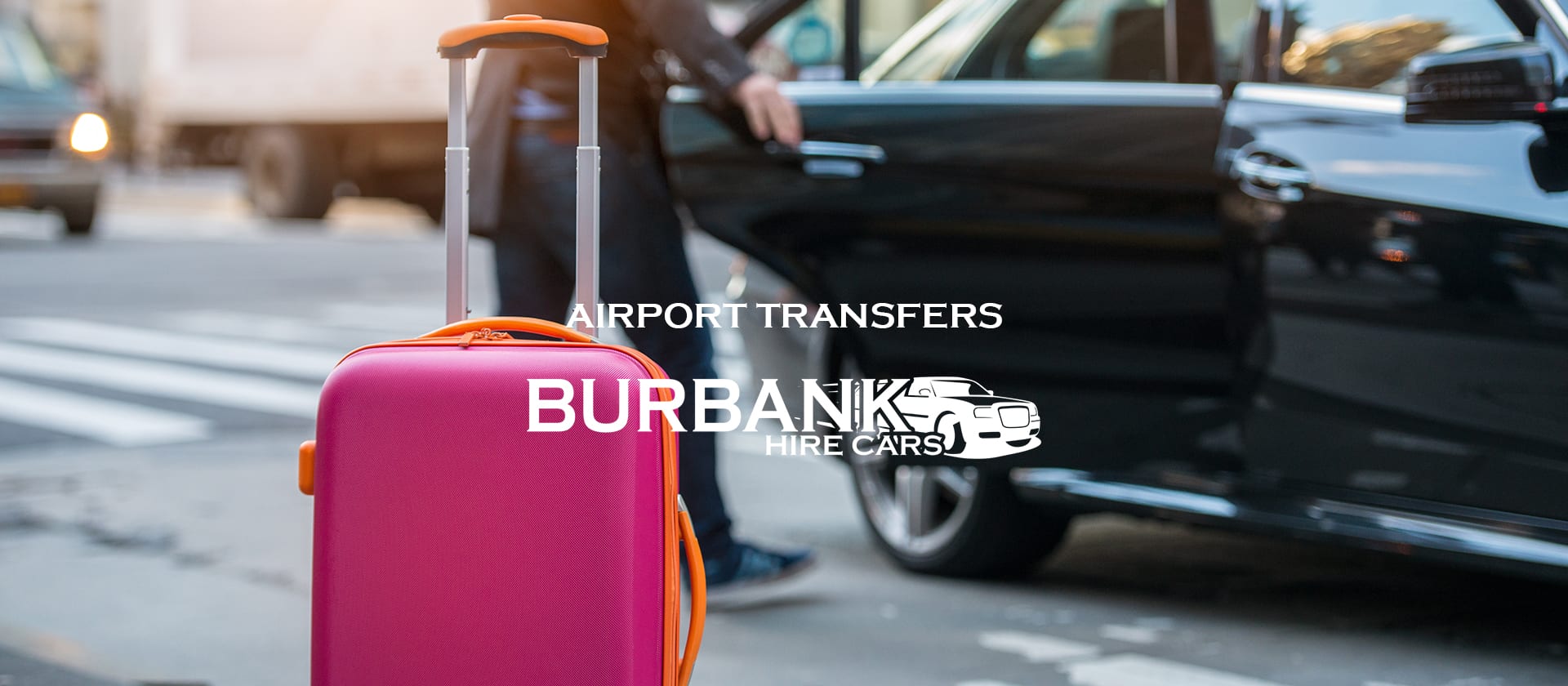 A bright pink suitcase with an orange handle is positioned in the foreground, with a person opening the door of a sleek black car in the background. The text 